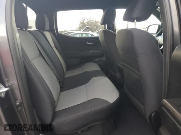 ✅ 2021 Toyota Tacoma SR5 • VIN: 3TMBZ5DN9MM029596 • Lot: 82180865. Listed on Copart with 68,238 mi. Free auction sales archive from the USA and detailed vehicle history report at DreamBid. Image 10.