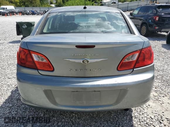✅ 2010 Chrysler Sebring Limited • VIN: 1C3CC5FB5AN136501 • Лот: 71092355. Опубликован ранее на Copart с пробегом 208 153 миль. Бесплатный доступ к архиву аукционных продаж из США и подробный отчёт об истории автомобиля на DreamBid. Изображение 6.