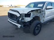 ✅ 2023 Toyota Tacoma TRD Off Road • VIN: 3TMCZ5AN7PM596113 • Lot: 43905623. Listed on IAAI with 56,739 mi. Free auction sales archive from the USA and detailed vehicle history report at DreamBid. Image 6.