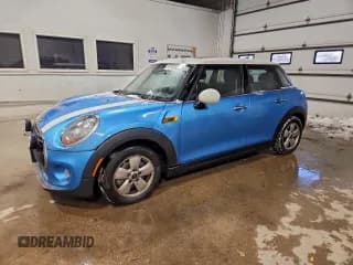 ✅ 2016 MINI Hardtop 4 Door • VIN: WMWXU1C56G2D09969 • Lot: 97151405. Listed on Copart with 85,753 mi. Free auction sales archive from the USA and detailed vehicle history report at DreamBid. Image 1.