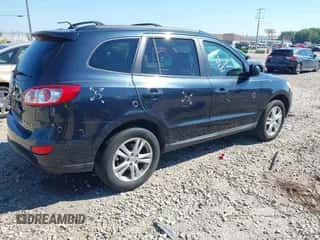 2011 Hyundai Santa Fe SE z VIN 5XYZHDAG1BG062779, wystawiony jako IAAI lot #43229073 z przebiegiem 162 168 mil mil oraz . Historia ofert i sprzedaży dostępna na DreamBid. Obrazek 4.