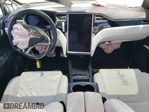 ✅ 2017 Tesla Model X P90D • VIN: 5YJXCAE45HF075748 • Lot: 63442394. Listed on Copart with 126,746 mi. Free auction sales archive from the USA and detailed vehicle history report at DreamBid. Image 8.
