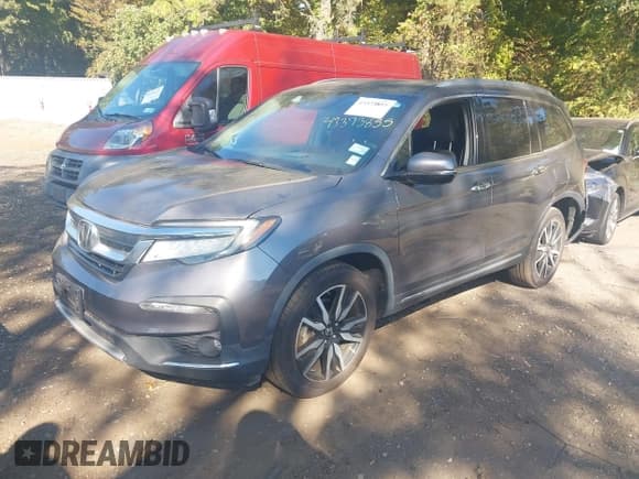 ✅ 2019 Honda Pilot Touring 7-Passenger • VIN: 5FNYF6H67KB011403 • Lot: 43373855. Listed on IAAI with 56,889 mi. Free auction sales archive from the USA and detailed vehicle history report at DreamBid. Image 19.