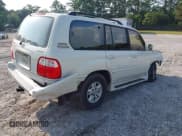 ✅ 1999 Lexus LX 470 • VIN: JT6HT00W7X0045176 • Lot: 42430770. Wystawiony na IAAI z przebiegiem 312 201 mil. Bezpłatny archiwum sprzedaży aukcyjnych z USA i szczegółowy raport historii pojazdu na DreamBid. Zdjęcie 4.