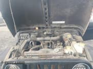 ✅ 1999 Jeep Wrangler Sport • VIN: 1J4FY19S5XP482862 • Лот: 43733183. Опубликован ранее на IAAI с пробегом 194 664 миль. Бесплатный доступ к архиву аукционных продаж из США и подробный отчёт об истории автомобиля на DreamBid. Изображение 10.