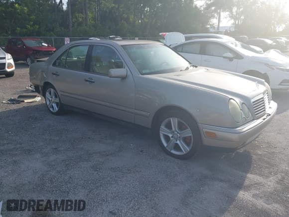 ✅ 1997 Mercedes-Benz E 320 • VIN: WDBJF72F8VA519603 • Lot: 43074761. Listed on IAAI with 214,704 mi. Free auction sales archive from the USA and detailed vehicle history report at DreamBid. Image 1.