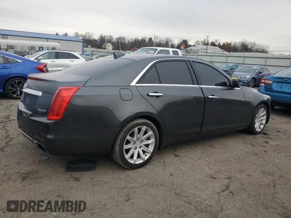 ✅ 2015 Cadillac CTS RWD • VIN: 1G6AP5SX1F0143400 • Lot: 85603234. Wystawiony na Copart z przebiegiem 94 613 mil. Bezpłatny archiwum sprzedaży aukcyjnych z USA i szczegółowy raport historii pojazdu na DreamBid. Zdjęcie 3.