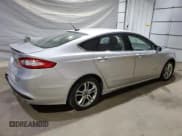 ✅ 2016 Ford Fusion SE Hybrid • VIN: 3FA6P0LUXGR321788 • Lot: 80886235. Wystawiony na Copart z przebiegiem 117 385 mil. Bezpłatny archiwum sprzedaży aukcyjnych z USA i szczegółowy raport historii pojazdu na DreamBid. Zdjęcie 3.