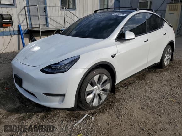 ✅ 2023 Tesla Model Y Long Range • VIN: 7SAYGDEE9PA098533 • Лот: 82690655. Опубликован ранее на Copart с пробегом 59 560 миль. Бесплатный доступ к архиву аукционных продаж из США и подробный отчёт об истории автомобиля на DreamBid. Изображение 1.