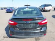 ✅ 2014 Ford Focus Titanium • VIN: 1FADP3J23EL237429 • Lot: 43358765. Listed on IAAI with 138,960 mi. Free auction sales archive from the USA and detailed vehicle history report at DreamBid. Image 16.