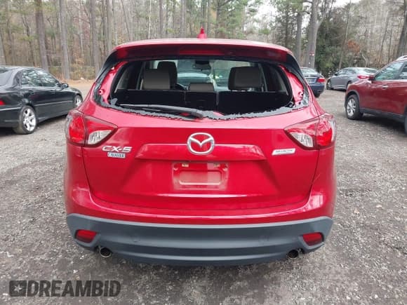 ✅ 2016 Mazda CX-5 Touring • VIN: JM3KE2CY3G0897193 • Lot: 43785978. Listed on IAAI with 119,937 mi. Free auction sales archive from the USA and detailed vehicle history report at DreamBid. Image 16.