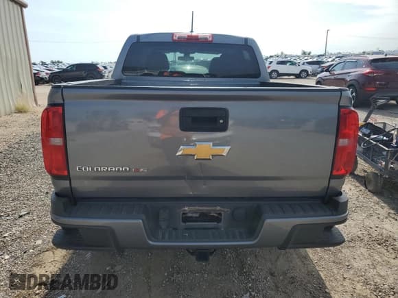 ✅ 2020 Chevrolet Colorado 2WD Work Truck • VIN: 1GCGSBEN6L1241259 • Лот: 71751034. Опубликован ранее на Copart с пробегом 124 873 миль. Бесплатный доступ к архиву аукционных продаж из США и подробный отчёт об истории автомобиля на DreamBid. Изображение 6.