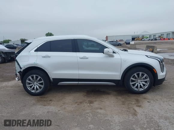 ✅ 2023 Cadillac XT4 FWD Premium Luxury • VIN: 1GYFZCR49PF225817 • Лот: 42408494. Опубликован ранее на IAAI с пробегом 5 977 миль. Бесплатный доступ к архиву аукционных продаж из США и подробный отчёт об истории автомобиля на DreamBid. Изображение 13.