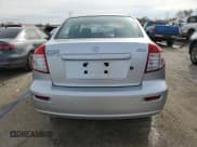 ✅ 2009 Suzuki SX4 FWD • VIN: JS2YC412296201061 • Лот: 79829224. Опубликован ранее на Copart с пробегом 206 335 миль. Бесплатный доступ к архиву аукционных продаж из США и подробный отчёт об истории автомобиля на DreamBid. Изображение 6.