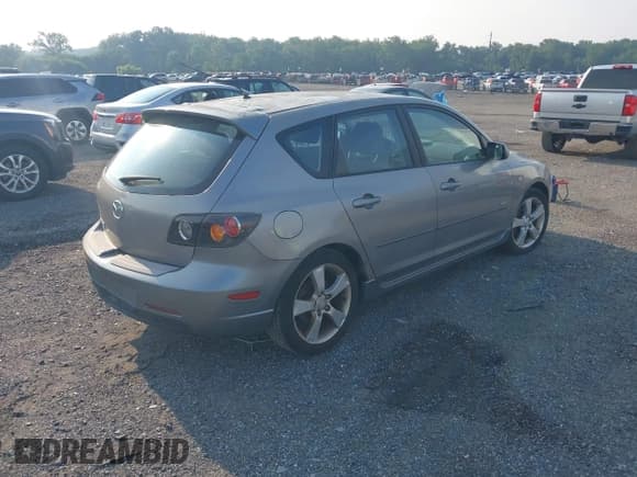✅ 2005 Mazda 3 s • VIN: JM1BK143951255390 • Lot: 42851705. Listed on IAAI with 209,770 mi. Free auction sales archive from the USA and detailed vehicle history report at DreamBid. Image 4.