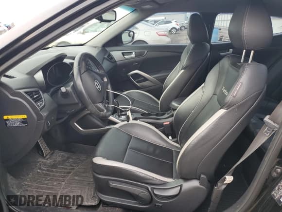 ✅ 2013 Hyundai Veloster Turbo • VIN: KMHTC6AE6DU169421 • Lot: 46337345. Wystawiony na Copart z przebiegiem 123 496 mil. Bezpłatny archiwum sprzedaży aukcyjnych z USA i szczegółowy raport historii pojazdu na DreamBid. Zdjęcie 7.