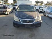 ✅ 2009 Honda Odyssey EX-L • VIN: 5FNRL387X9B411700 • Lot: 90916965. Wystawiony na Copart z przebiegiem 239 517 mil. Bezpłatny archiwum sprzedaży aukcyjnych z USA i szczegółowy raport historii pojazdu na DreamBid. Zdjęcie 5.
