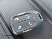 ✅ 2021 Chevrolet Silverado 1500 RST • VIN: 1GCUYEED2MZ282579 • Lot: 42703358. Listed on IAAI with 3,991 mi. Free auction sales archive from the USA and detailed vehicle history report at DreamBid. Image 11.