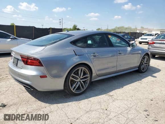 ✅ 2016 Audi A7 Prestige • VIN: WAU2GAFC7GN025581 • Лот: 71649105. Опубликован ранее на Copart с пробегом 114 116 миль. Бесплатный доступ к архиву аукционных продаж из США и подробный отчёт об истории автомобиля на DreamBid. Изображение 3.