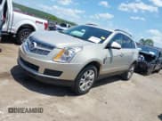 ✅ 2012 Cadillac SRX • VIN: 3GYFNGE37CS630953 • Lot: 42509427. Listed on IAAI with 123,545 mi. Free auction sales archive from the USA and detailed vehicle history report at DreamBid. Image 2.