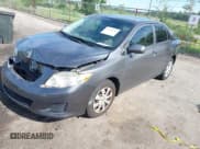 ✅ 2010 Toyota Corolla • VIN: JTDBU4EE0AJ075558 • Lot: 42333233. Listed on IAAI with 98,969 mi. Free auction sales archive from the USA and detailed vehicle history report at DreamBid. Image 2.