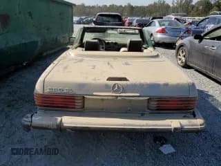 ✅ 1988 Mercedes-Benz 560 SL • VIN: WDBBA48D8JA079450 • Лот: 74524064. Опубликован ранее на Copart с пробегом Не указан. Бесплатный доступ к архиву аукционных продаж из США и подробный отчёт об истории автомобиля на DreamBid. Изображение 6.