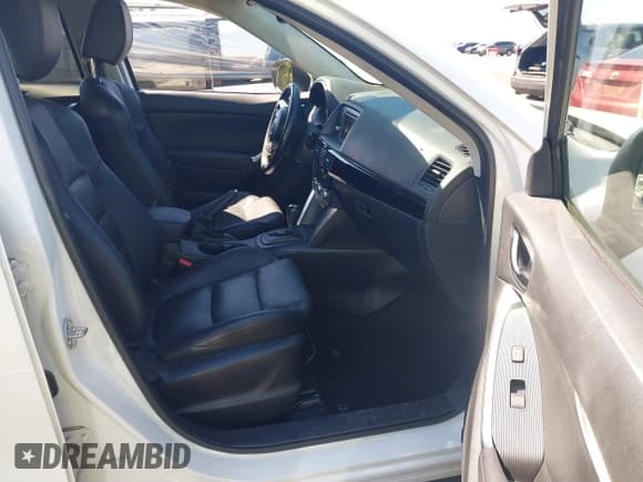 ✅ 2014 Mazda CX-5 Grand Touring • VIN: JM3KE2DYXE0334458 • Lot: 43051005. Wystawiony na IAAI z przebiegiem 182 568 mil. Bezpłatny archiwum sprzedaży aukcyjnych z USA i szczegółowy raport historii pojazdu na DreamBid. Zdjęcie 5.