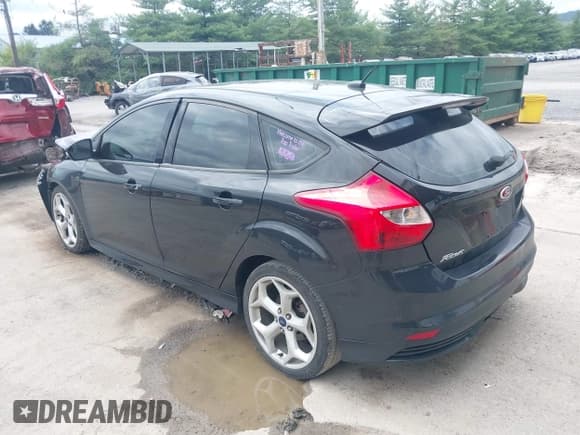 ✅ 2013 Ford Focus ST • VIN: 1FADP3L94DL294702 • Lot: 42891657. Listed on IAAI with 180,920 mi. Free auction sales archive from the USA and detailed vehicle history report at DreamBid. Image 3.