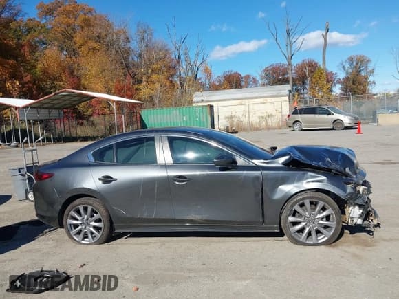 ✅ 2023 Mazda 3 S Select • VIN: 3MZBPABMXPM358463 • Lot: 43643544. Listed on IAAI with 56,857 mi. Free auction sales archive from the USA and detailed vehicle history report at DreamBid. Image 13.