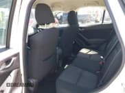 ✅ 2016 Mazda CX-5 Sport • VIN: JM3KE2BY5G0793032 • Lot: 42128706. Listed on IAAI with 52,010 mi. Free auction sales archive from the USA and detailed vehicle history report at DreamBid. Image 8.