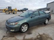 ✅ 2002 Toyota Camry XLE • VIN: 4T1BF30K52U539571 • Lot: 93326725. Listed on Copart with 233,708 mi. Free auction sales archive from the USA and detailed vehicle history report at DreamBid. Image 1.