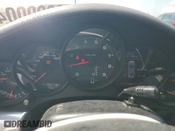 ✅ 2015 Porsche 911 Carrera • VIN: WP0AA2A90FS106651 • Lot: 68900045. Wystawiony na Copart z przebiegiem 117 807 mil. Bezpłatny archiwum sprzedaży aukcyjnych z USA i szczegółowy raport historii pojazdu na DreamBid. Zdjęcie 9.