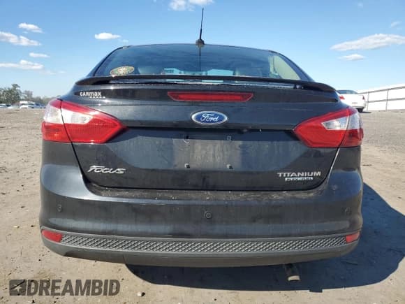 ✅ 2014 Ford Focus Titanium • VIN: 1FADP3J29EL365609 • Лот: 71810975. Опубликован ранее на Copart с пробегом 97 391 миль. Бесплатный доступ к архиву аукционных продаж из США и подробный отчёт об истории автомобиля на DreamBid. Изображение 6.