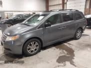 ✅ 2012 Honda Odyssey EX-L • VIN: 5FNRL5H67CB100705 • Lot: 43821207. Listed on IAAI with 105,432 mi. Free auction sales archive from the USA and detailed vehicle history report at DreamBid. Image 2.
