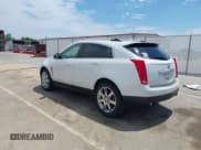 ✅ 2010 Cadillac SRX Performance Collection • VIN: 3GYFNEEY4AS548899 • Lot: 42216296. Wystawiony na IAAI z przebiegiem 228 903 mil. Bezpłatny archiwum sprzedaży aukcyjnych z USA i szczegółowy raport historii pojazdu na DreamBid. Zdjęcie 3.