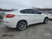 ✅ 2013 BMW X6 M • VIN: 5YMGZ0C5XD0C40121 • Lot: 49946635. Listed on Copart with 193,527 mi. Free auction sales archive from the USA and detailed vehicle history report at DreamBid. Image 3.