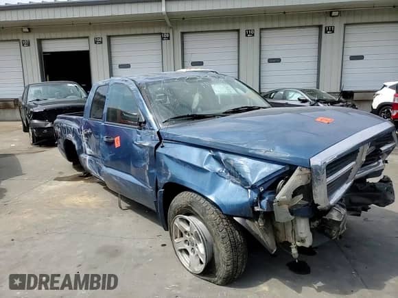2005 Dodge Dakota ST z VIN 1D7HW28K85S168893, wystawiony jako Copart lot #69955454 z przebiegiem Nie podano mil oraz Szkoda całkowita • Salvage title. Historia ofert i sprzedaży dostępna na DreamBid. Obrazek 11.