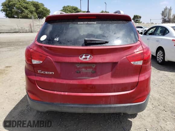 2015 Hyundai Tucson SE with VIN KM8JU3AG1FU054782, listed as a Copart auction lot 63942353 with 142,314 mi miles and . Bid and sale history available at DreamBid. Image 6.
