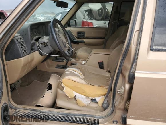 ✅ 1999 Jeep Cherokee Limited • VIN: 1J4FF78S8XL552596 • Lot: 49181115. Listed on Copart with 141,434 mi. Free auction sales archive from the USA and detailed vehicle history report at DreamBid. Image 7.