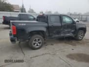 ✅ 2019 Chevrolet Colorado 4WD Z71 • VIN: 1GCGTDEN5K1329341 • Лот: 71913234. Опубликован ранее на Copart с пробегом 56 159 миль. Бесплатный доступ к архиву аукционных продаж из США и подробный отчёт об истории автомобиля на DreamBid. Изображение 3.