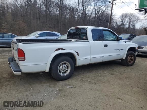 ✅ 2000 Dodge Dakota Sport • VIN: 1B7GG22N0YS754420 • Лот: 46234915. Опубликован ранее на Copart с пробегом 236 355 миль. Бесплатный доступ к архиву аукционных продаж из США и подробный отчёт об истории автомобиля на DreamBid. Изображение 3.
