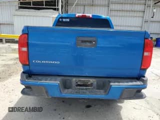 ✅ 2021 Chevrolet Colorado 2WD Work Truck • VIN: 1GCGSBEA6M1122948 • Лот: 64366204. Опубликован ранее на Copart с пробегом 48 567 миль. Бесплатный доступ к архиву аукционных продаж из США и подробный отчёт об истории автомобиля на DreamBid. Изображение 6.