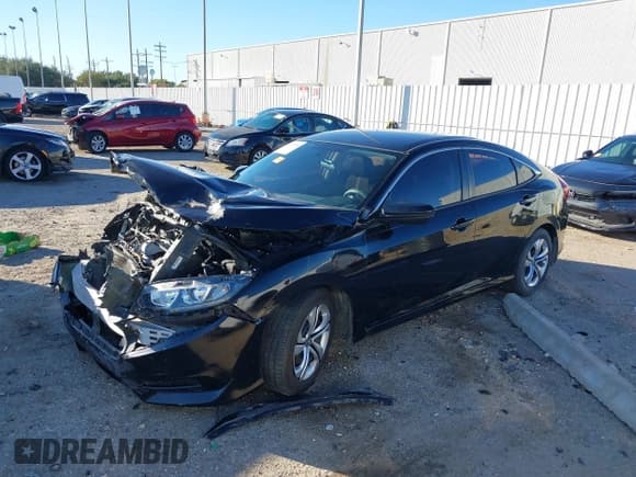 ✅ 2018 Honda Civic LX • VIN: 19XFC2F55JE005154 • Lot: 43661806. Listed on IAAI with 99,103 mi. Free auction sales archive from the USA and detailed vehicle history report at DreamBid. Image 17.