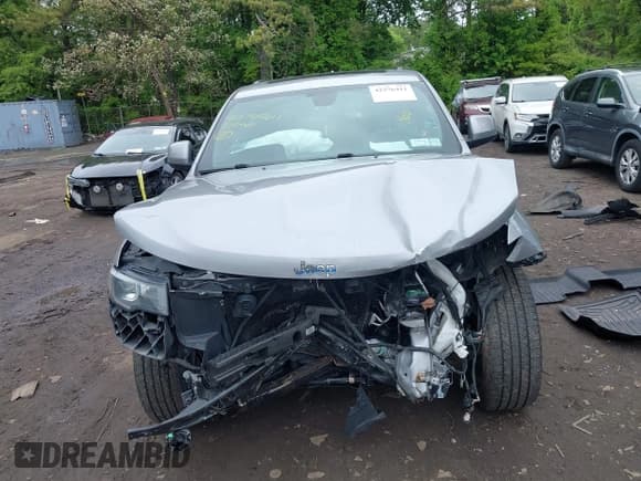 ✅ 2020 Jeep Grand Cherokee Laredo E • VIN: 1C4RJFAG3LC199485 • Lot: 42276411. Listed on IAAI with 109,489 mi. Free auction sales archive from the USA and detailed vehicle history report at DreamBid. Image 12.