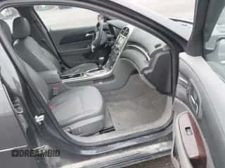 2013 Chevrolet Malibu LT z VIN 1G11C5SA6DF133873, wystawiony jako IAAI lot #43519043 z przebiegiem 124 213 mil mil oraz . Historia ofert i sprzedaży dostępna na DreamBid. Obrazek 5.