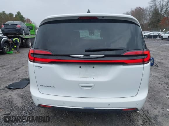 ✅ 2023 Chrysler Pacifica Touring L • VIN: 2C4RC1BG6PR528933 • Lot: 43666386. Listed on IAAI with 63,989 mi. Free auction sales archive from the USA and detailed vehicle history report at DreamBid. Image 16.
