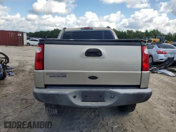 ✅ 2004 Ford Explorer Sport Trac XLS • VIN: 1FMZU67K24UB43080 • Lot: 56876915. Wystawiony na Copart z przebiegiem 174 626 mil. Bezpłatny archiwum sprzedaży aukcyjnych z USA i szczegółowy raport historii pojazdu na DreamBid. Zdjęcie 6.