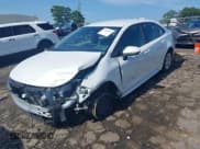 ✅ 2024 Toyota Corolla Hybrid LE • VIN: JTDBCMFE9R3050417 • Лот: 42891842. Опубликован ранее на IAAI с пробегом 22 268 миль. Бесплатный доступ к архиву аукционных продаж из США и подробный отчёт об истории автомобиля на DreamBid. Изображение 2.