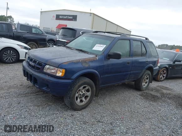 ✅ 2002 Isuzu Rodeo S • VIN: 4S2CK58W824315044 • Lot: 41532841. Listed on IAAI with 285,951 mi. Free auction sales archive from the USA and detailed vehicle history report at DreamBid. Image 2.