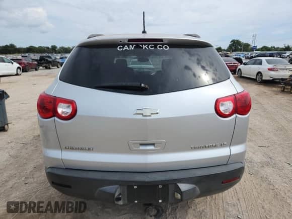 2009 Chevrolet Traverse LS z VIN 1GNER13D79S100962, wystawiony jako Copart lot #82315635 z przebiegiem 208 784 mil mil oraz Szkoda całkowita • Salvage title. Historia ofert i sprzedaży dostępna na DreamBid. Obrazek 6.